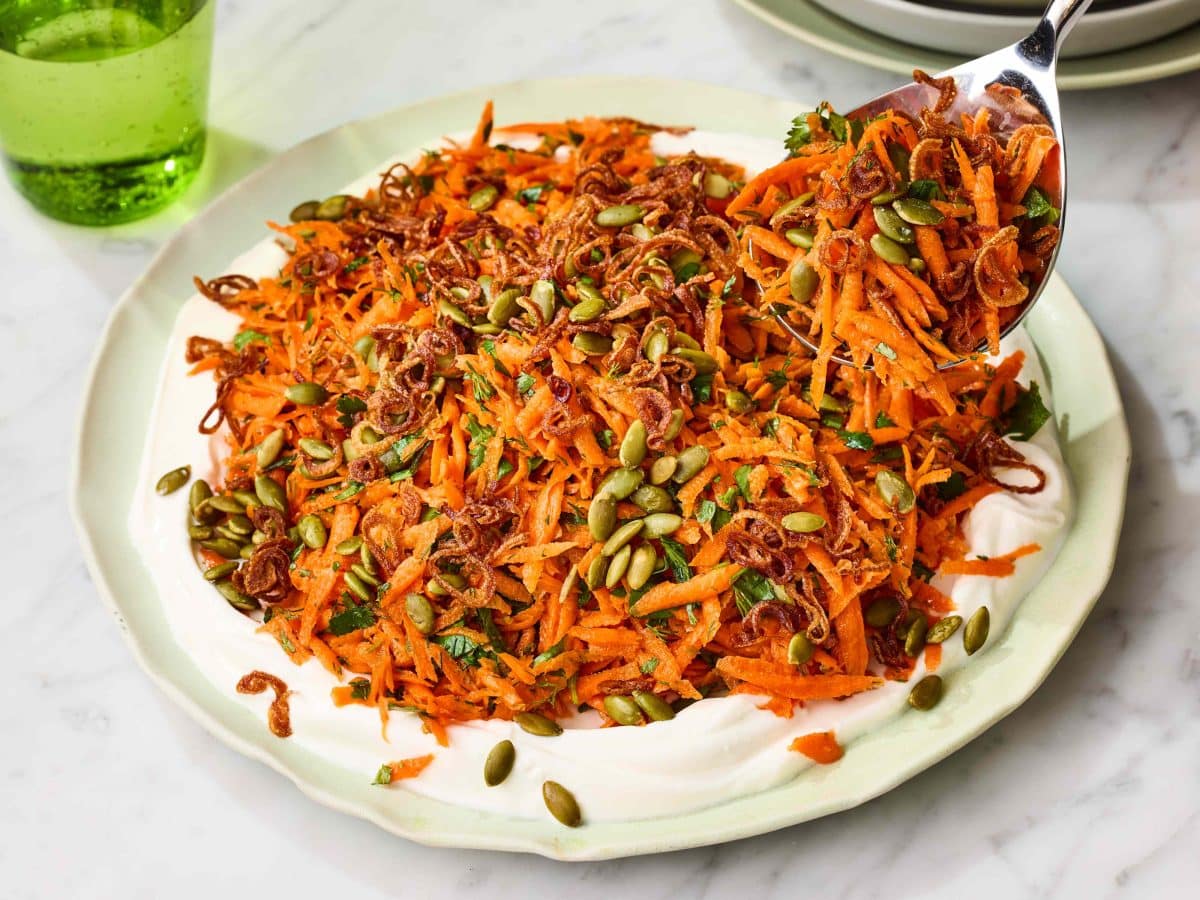Carrot Salad With Fried Shallots, Pepitas, and Yogurt