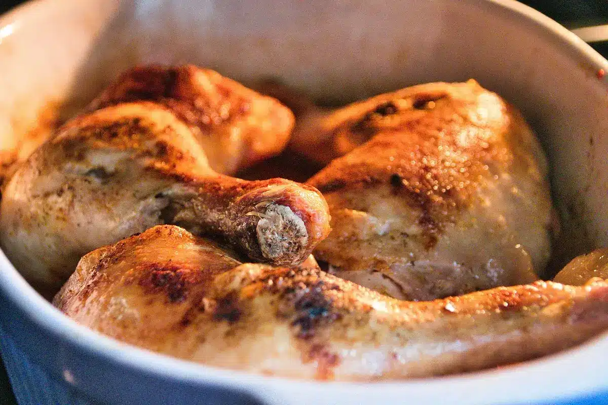 Patting chicken dry with paper towel before seasoning