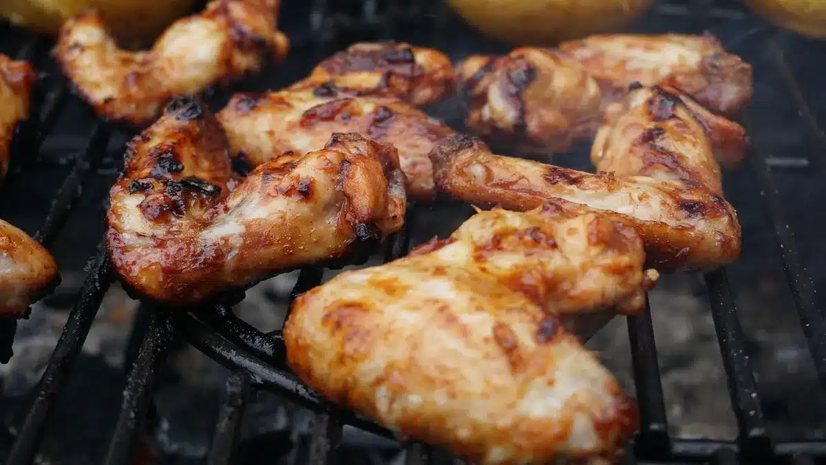 Family-style dinner table with crispy chicken and sides