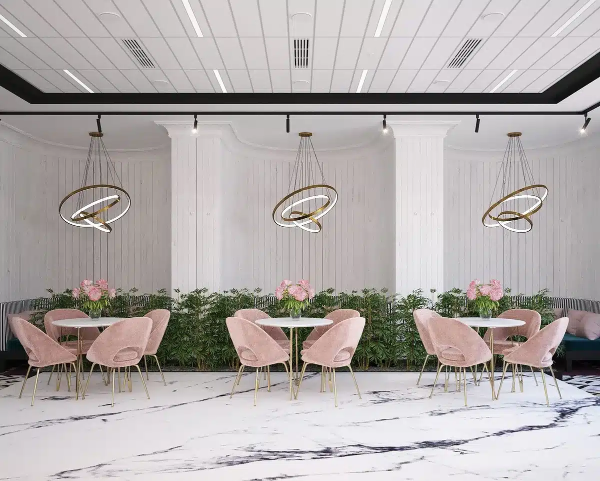 Interior of a French‑style bistro with warm wood and curved seating