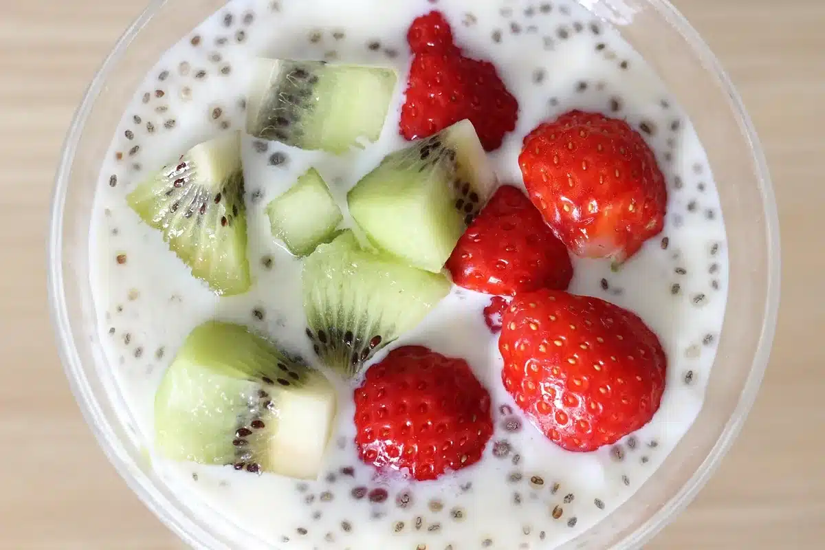 Greek yogurt parfait layered with honey and toasted walnuts in a bowl