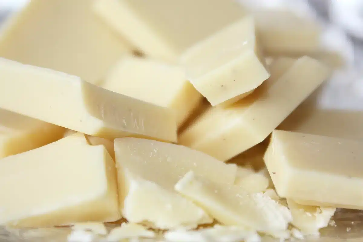Butter melting in a pot with separated milk solids
