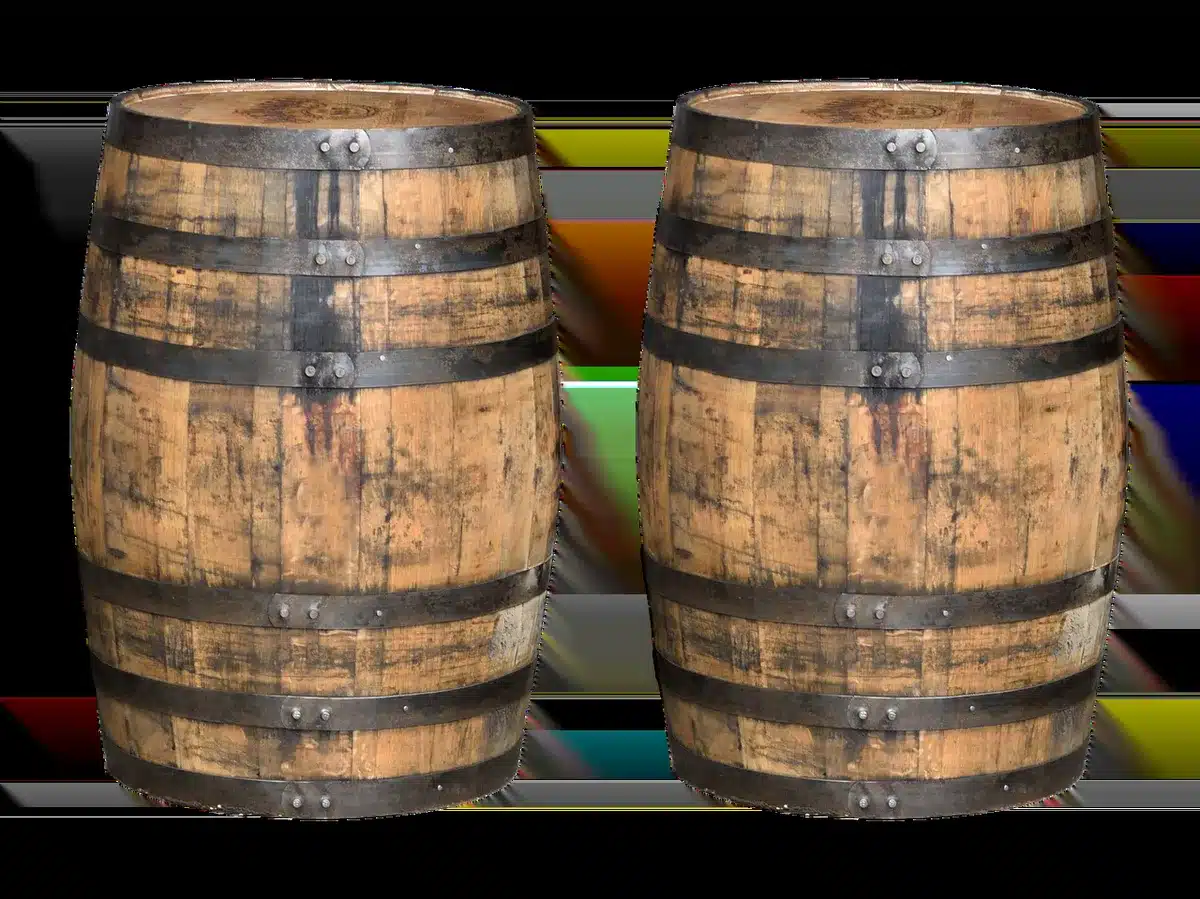 Close-up of vintage bottle labels showing 'whisky' and 'whiskey' spellings