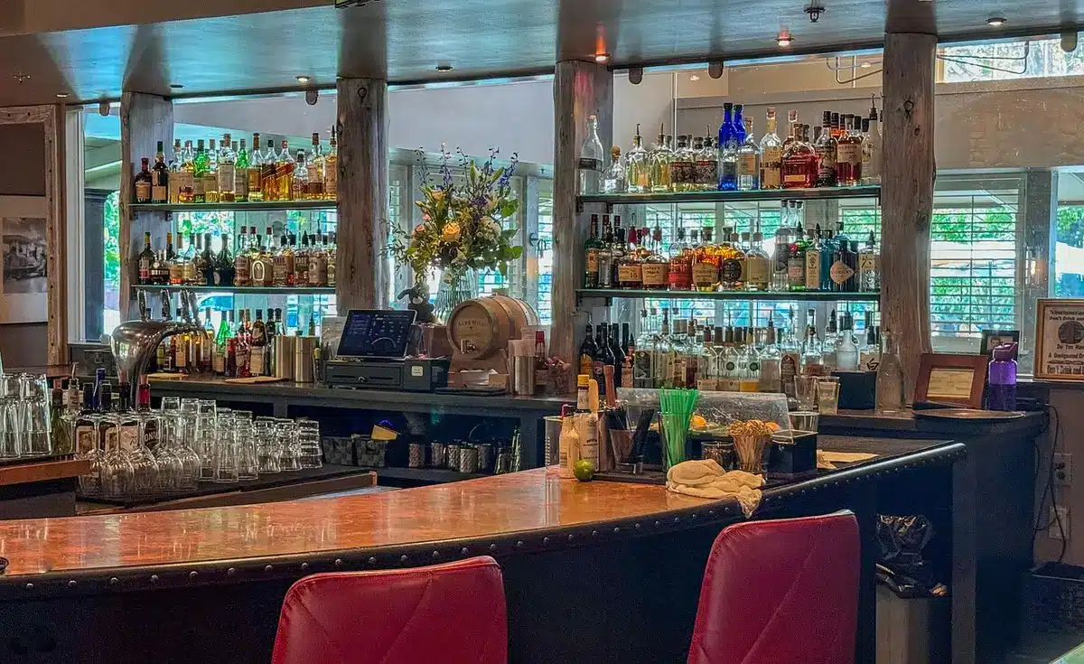 Bartender preparing an inventive cocktail at a bar